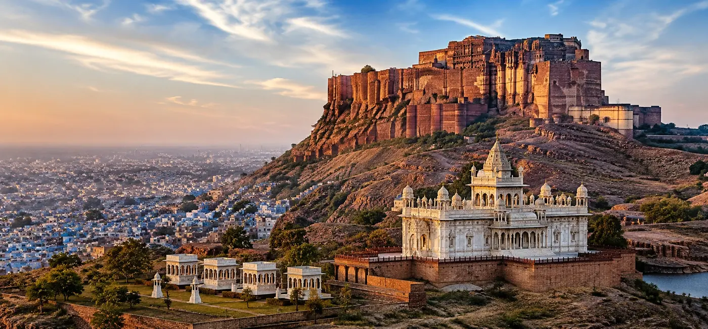 Hawa Mahal and historic Jaipur cityscape at sunset in Rajasthan, India