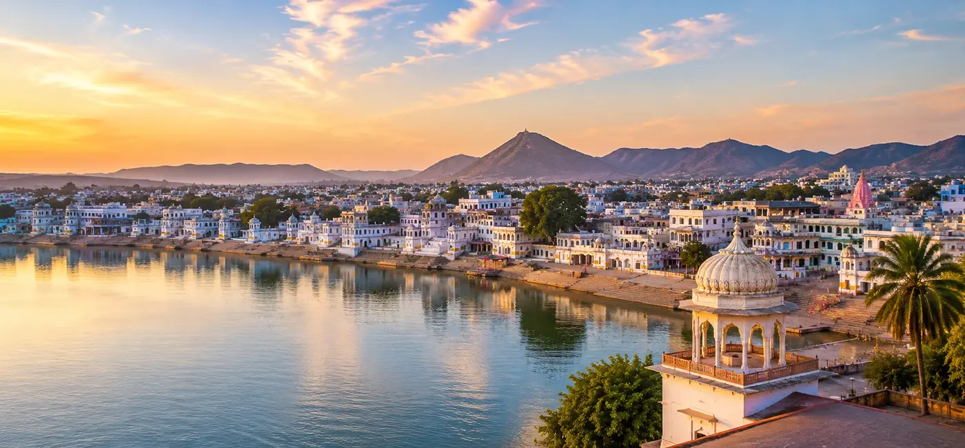 Hawa Mahal and historic Jaipur cityscape at sunset in Rajasthan, India